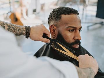 Step into Big Dawg Status—our ultimate haircut for clients who walk into any room knowing they’re th