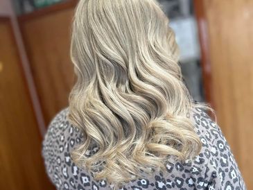 lady with long gray natural coloring vibrant silky hair