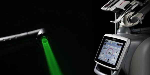 fotona laser, twin light, nd-yag, er-yag laser emitting green beam
