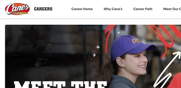 Two employees smiling at Raising Cane's, promoting their team.