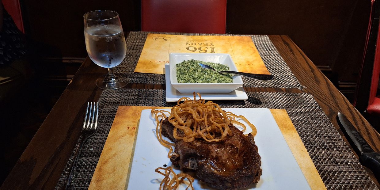 22 oz in-bone Gotham Rib Steak and Grandma's Creamed Spinach.