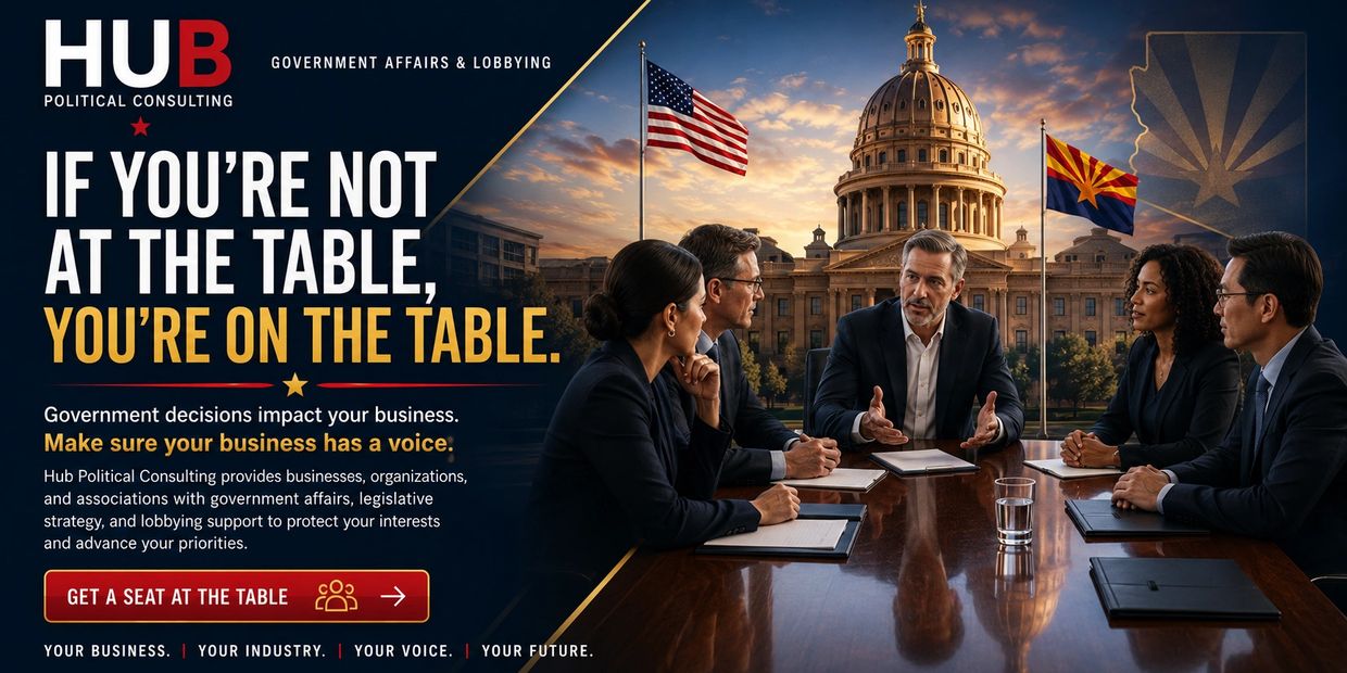 Business professionals discuss government affairs at a table with a state capitol backdrop.