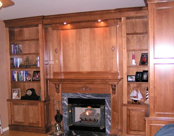 Built in entertainment center with mantel
