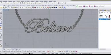 3D design of a 'Believe' necklace in modeling software.