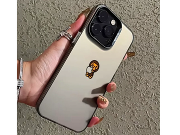 Hand holding phone with cartoon sticker.