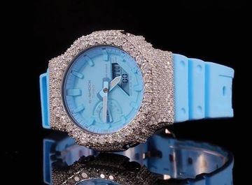 Blue watch with a diamond-encrusted bezel.