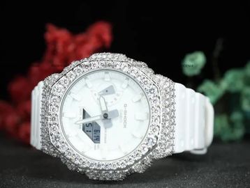 White luxury smartwatch adorned with diamonds.