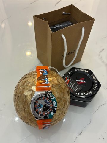 Colorful G-Shock watch with unique strap design.