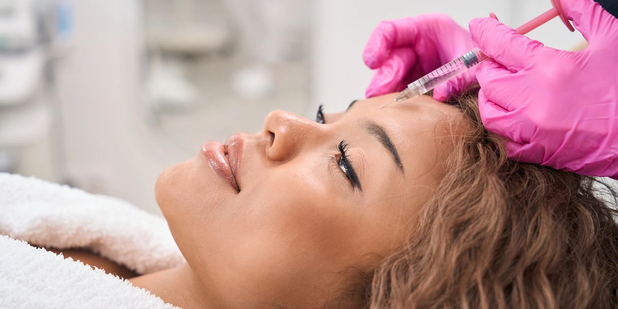 Patient receiving forehead injection
