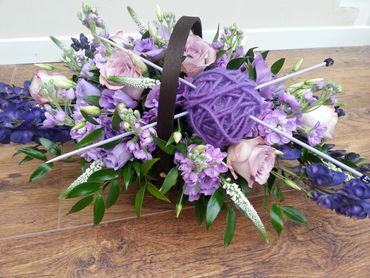 A basket gift arrangement - bespoke with an acknowledgement for her love of knitting