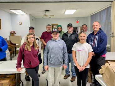 Scouts and their leaders who were part of a massive food drive for GWCM.