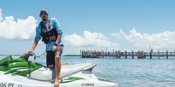 Man standing on Waverunner