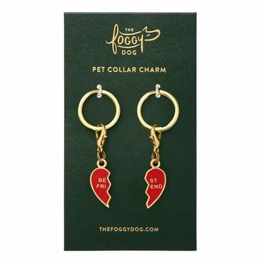 Gold pet collar charms shaped as broken heart halves with "Best Friend" text.