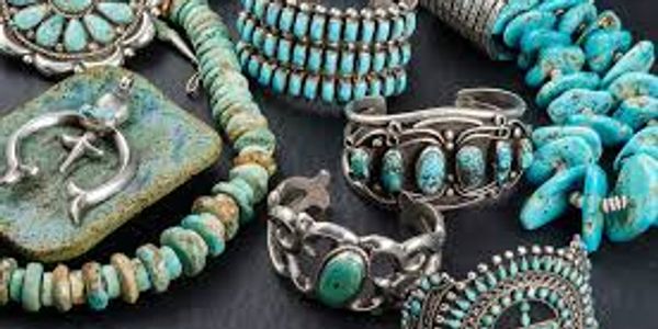 Authentic Native American jewelry pieces including cuff bracelets and necklaces with turquoise