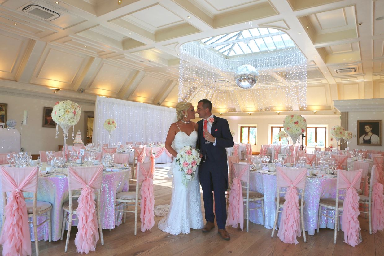 bride + groom in reception venue