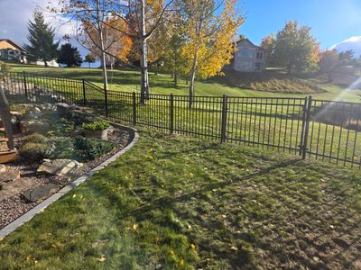 Residential fences installed in the backyard of a local property.