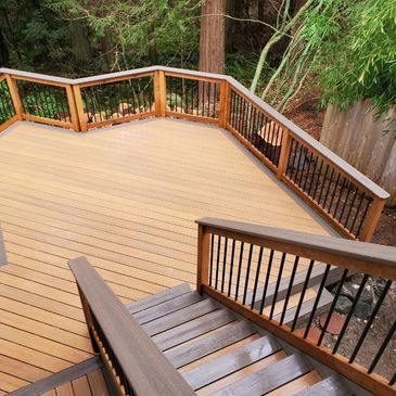 A custom deck with stairs and railing. 