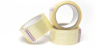 Industrial packaging tape for securing cartons during transportation and storage