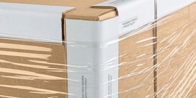 Cardboard edge protectors and strapping guards used with polyester and polypropylene strapping