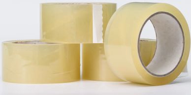 Heavy-duty packaging tape used for sealing cardboard boxes in shipping and logistics operations