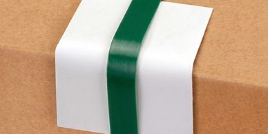 Strapping guards and strapping protectors used with polyester and polypropylene strapping