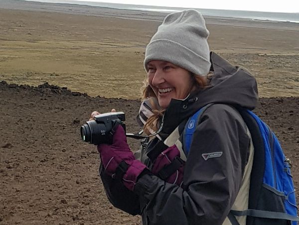 Maria Macc photographing land forms, Iceland