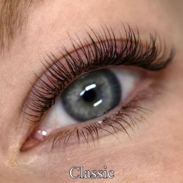 Close-up images of four eyelash extension styles: Classic, Hybrid, Volume, and Mega Volume.