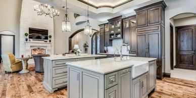 warm contrasting lines in a kitchen with dual islands
