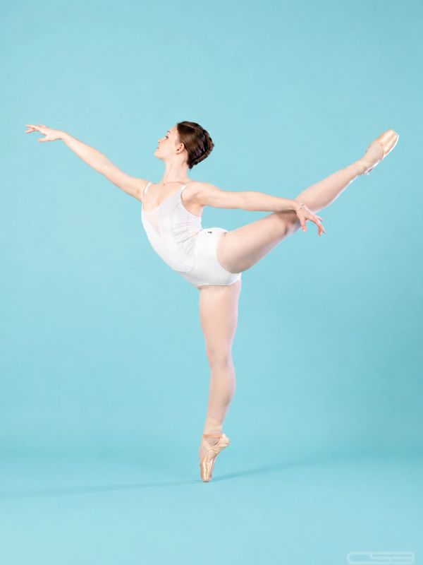 Ballet dancer performing an arabesque pose.