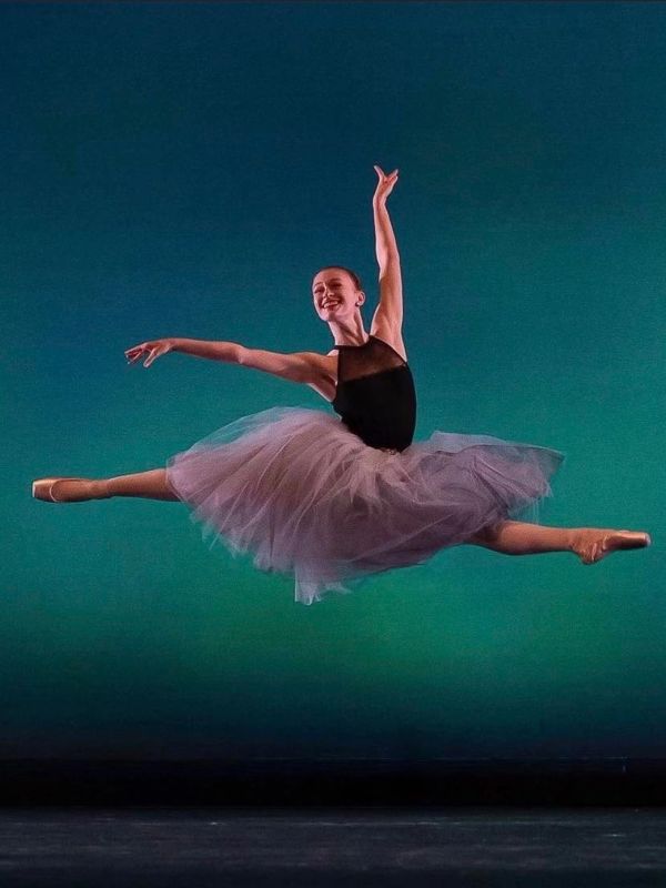 Ballet dancer performing a grand jeté.