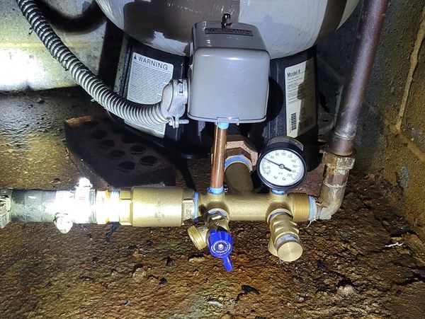 well system repair pressure switch and check valve