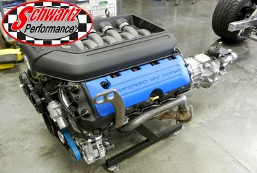High-performance Ford engine displayed in a workshop with Schwartz Performance logo.