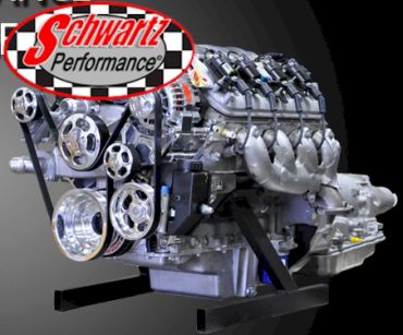 High-performance car engine with polished components and Schwartz Performance logo.