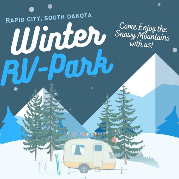 Winter RV Park in Rapid City, South Dakota with snowy mountains.