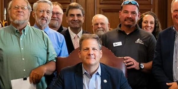 Brian with Governor Sununu at a recent proclamation signing.