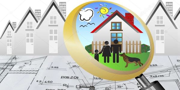 Magnifying glass highlighting a happy family and dog in front of a house on architectural blueprints.