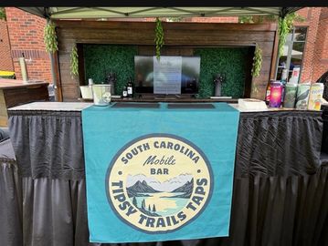 A South Carolina Mobile Bar setup with a banner.