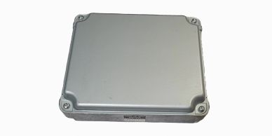 Metal electronic control unit box with screws.