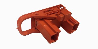 Orange plastic electrical connector with handle.