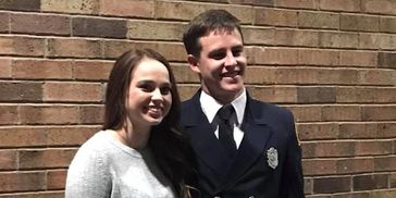 Eli and his wife after he graduated from Dallas Fire Academy
