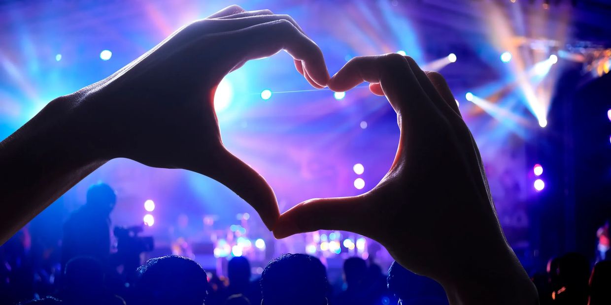 Heart hands at a concert