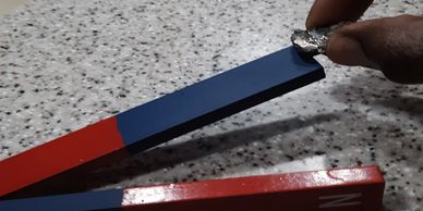 A REE-Aloy 6200™ additive permanent magnet