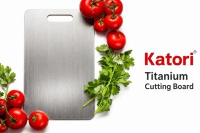 Titanium cutting board with tomatoes and coriander.