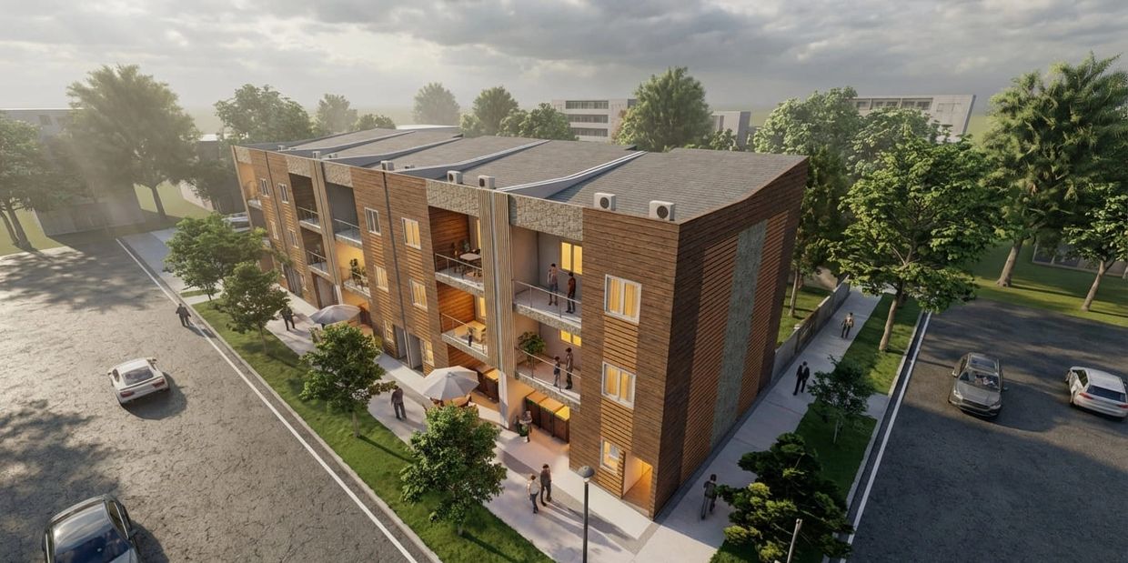 Modern three-story apartment building with balconies and surrounding greenery.