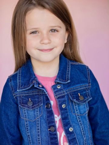 5 year old child model; Kids Click Agency; light brown hair; green/blue eyes; Miami child model
