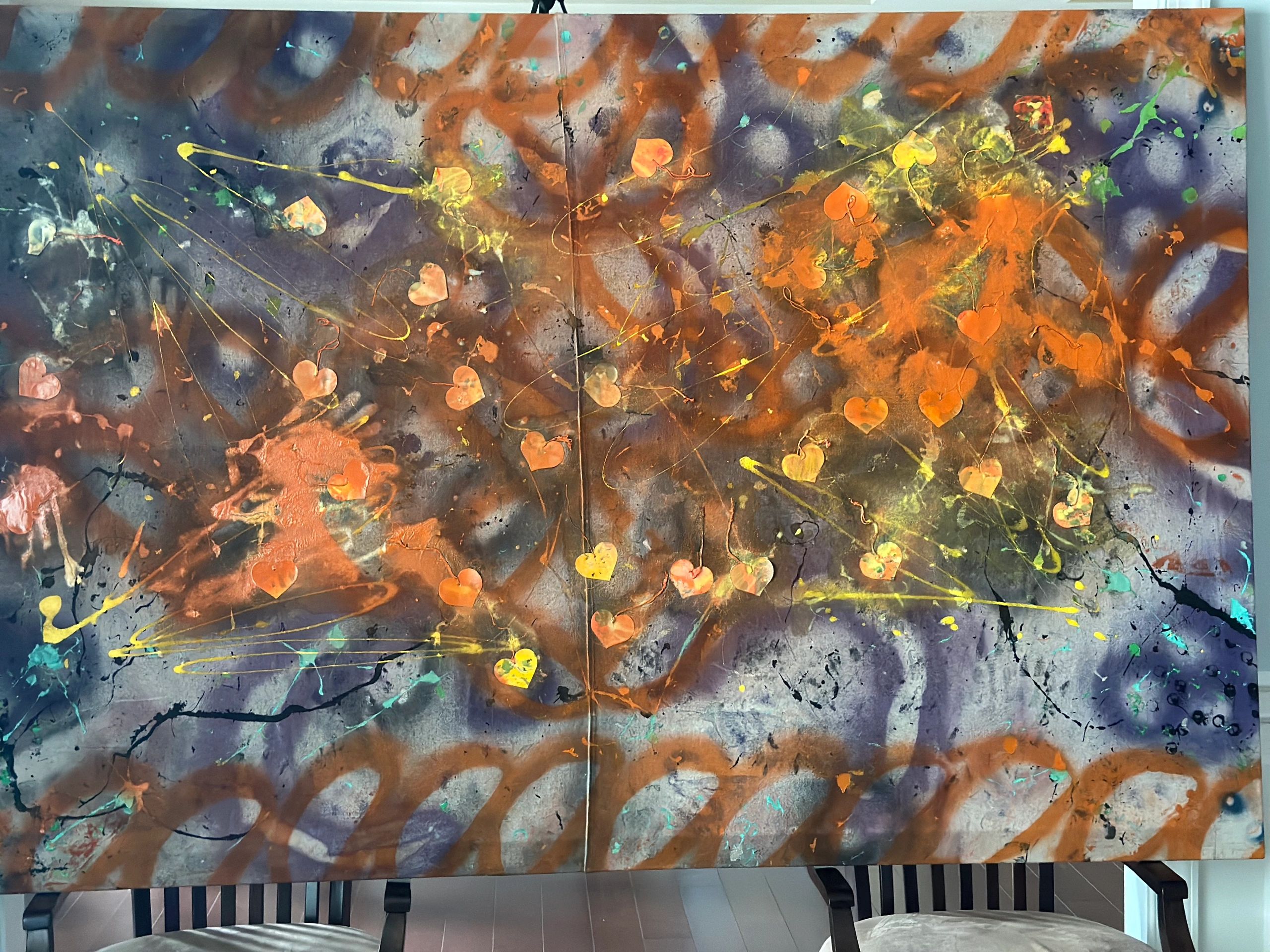 Colorful abstract painting with hearts and splashes.