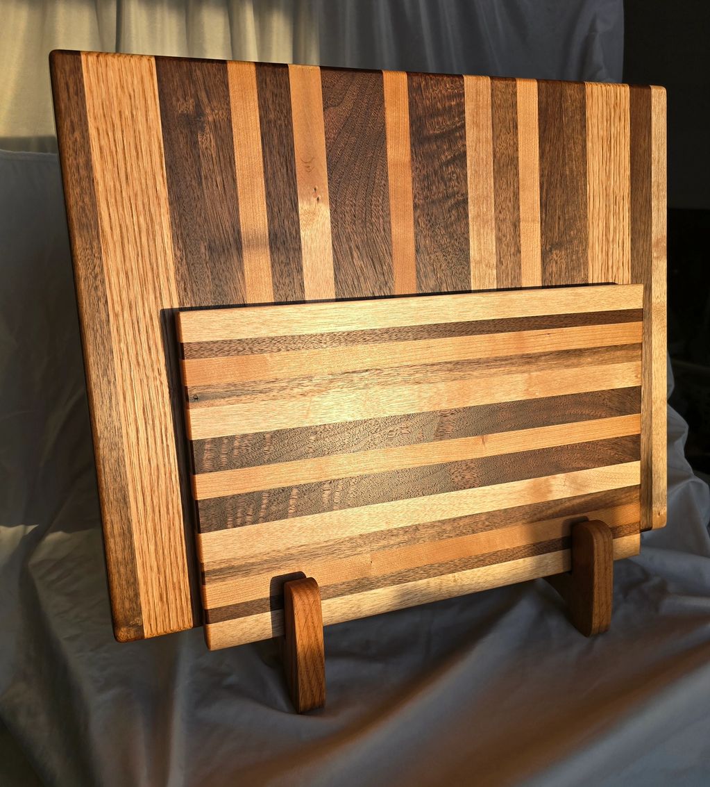 Picture of a set of two cutting boards built from a mixture of hardwoods.