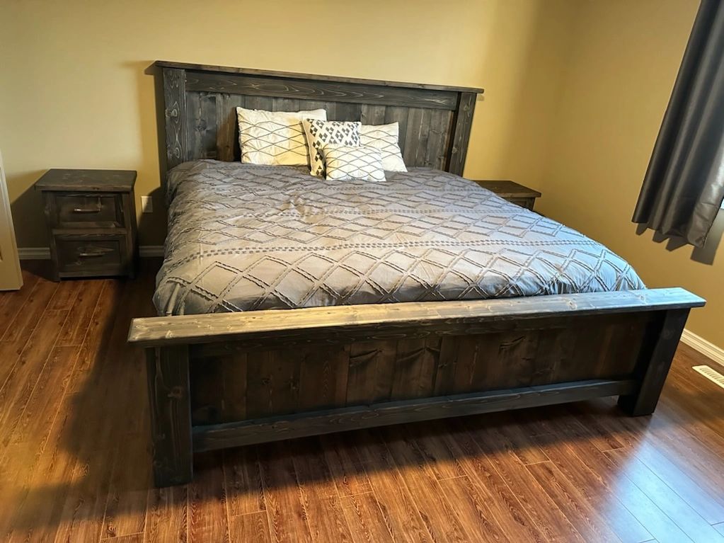 image of a solid wood custom king size bed finished in black stain