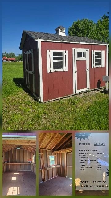 Red wooden storage shed with white trim in a grassy area under blue sky.
