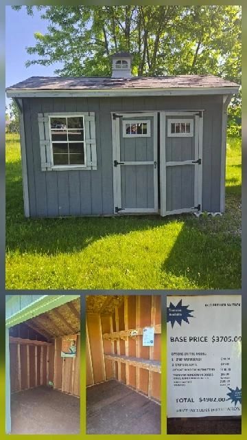 A gray outdoor shed with white trim and price details below.